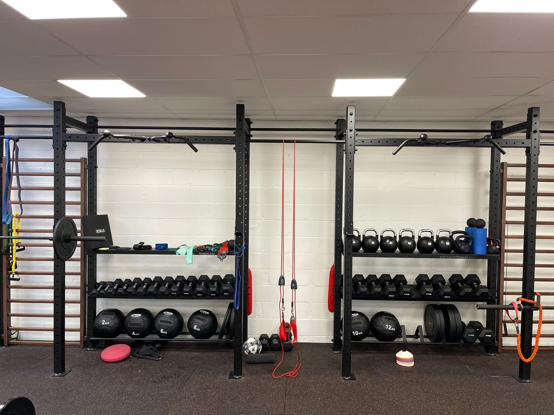 Gym weights properly placed in racks
