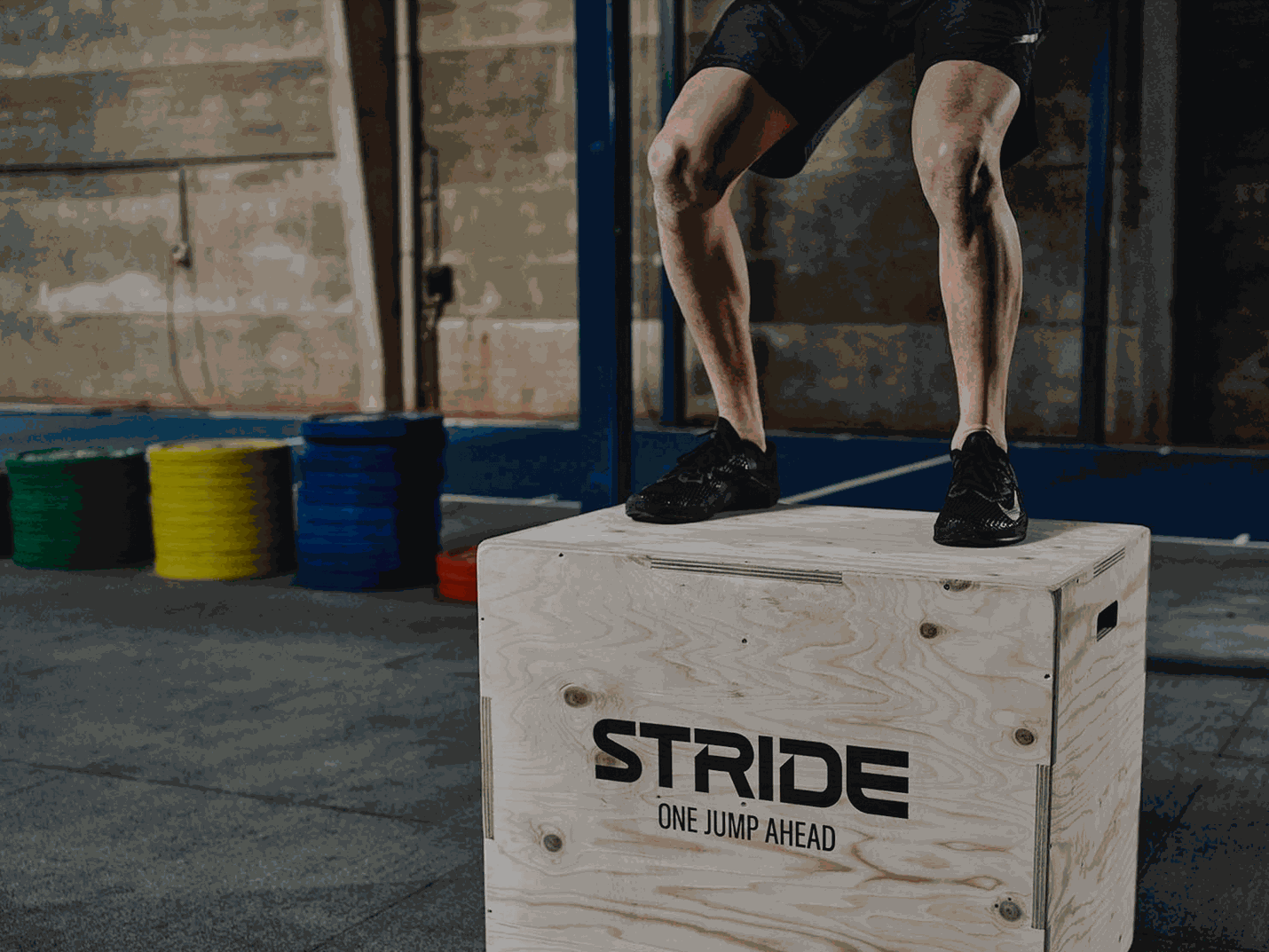 person standing on wooden box plyo