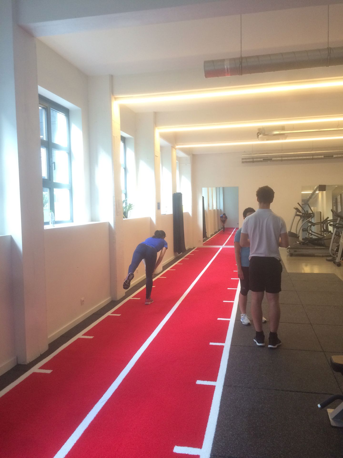 three persons in gym